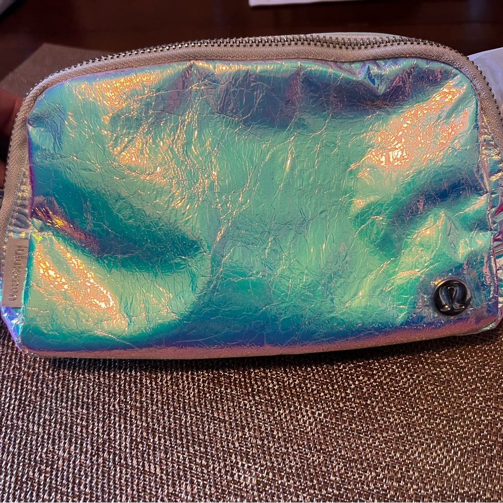 Brand new, great for summer wear.  Lululemon Iridescent Everywhere Belt Bag.